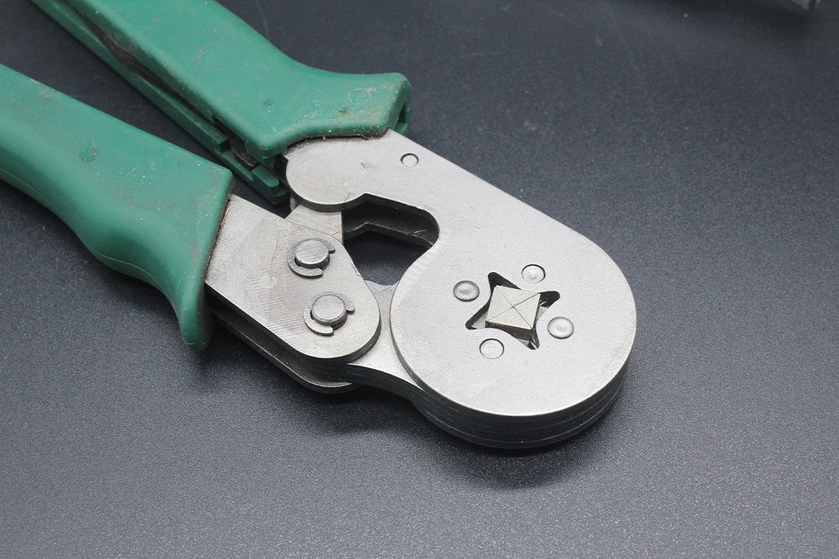 Metal pliers restored with laser cleaning showing a clean, polished surface in after-cleaning comparison.