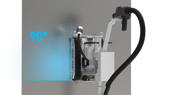 Laser cleaning operator removing graffiti from a concrete wall using a high-precision fiber laser for safe, non-abrasive restoration.