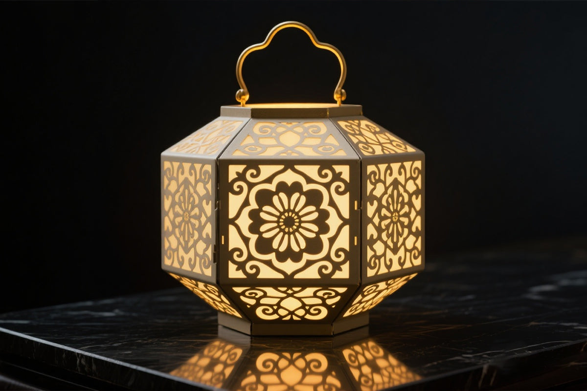 Decorative metal lantern with intricate cut patterns welded using laser spot welding.