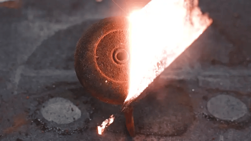 Industrial laser cleaning machine removing rust from metal surface using high-precision fiber laser technology.