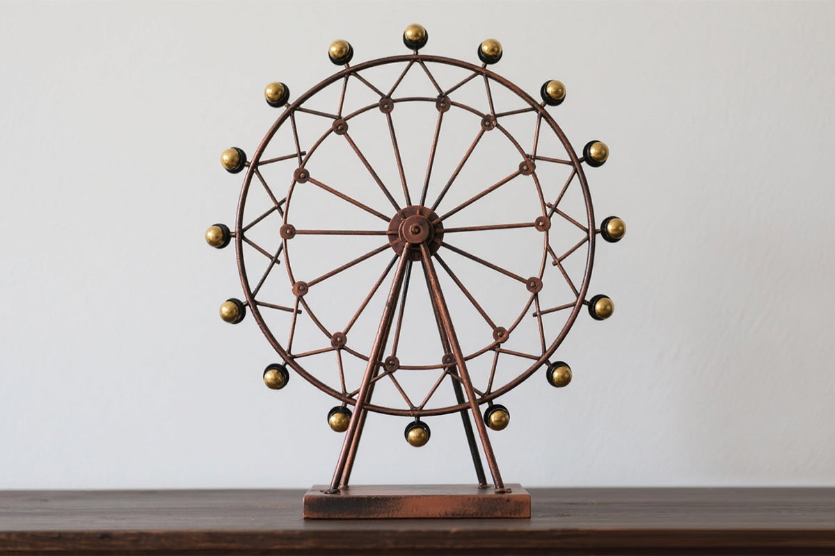 Metal ferris wheel art sculpture assembled with precision laser spot welding.