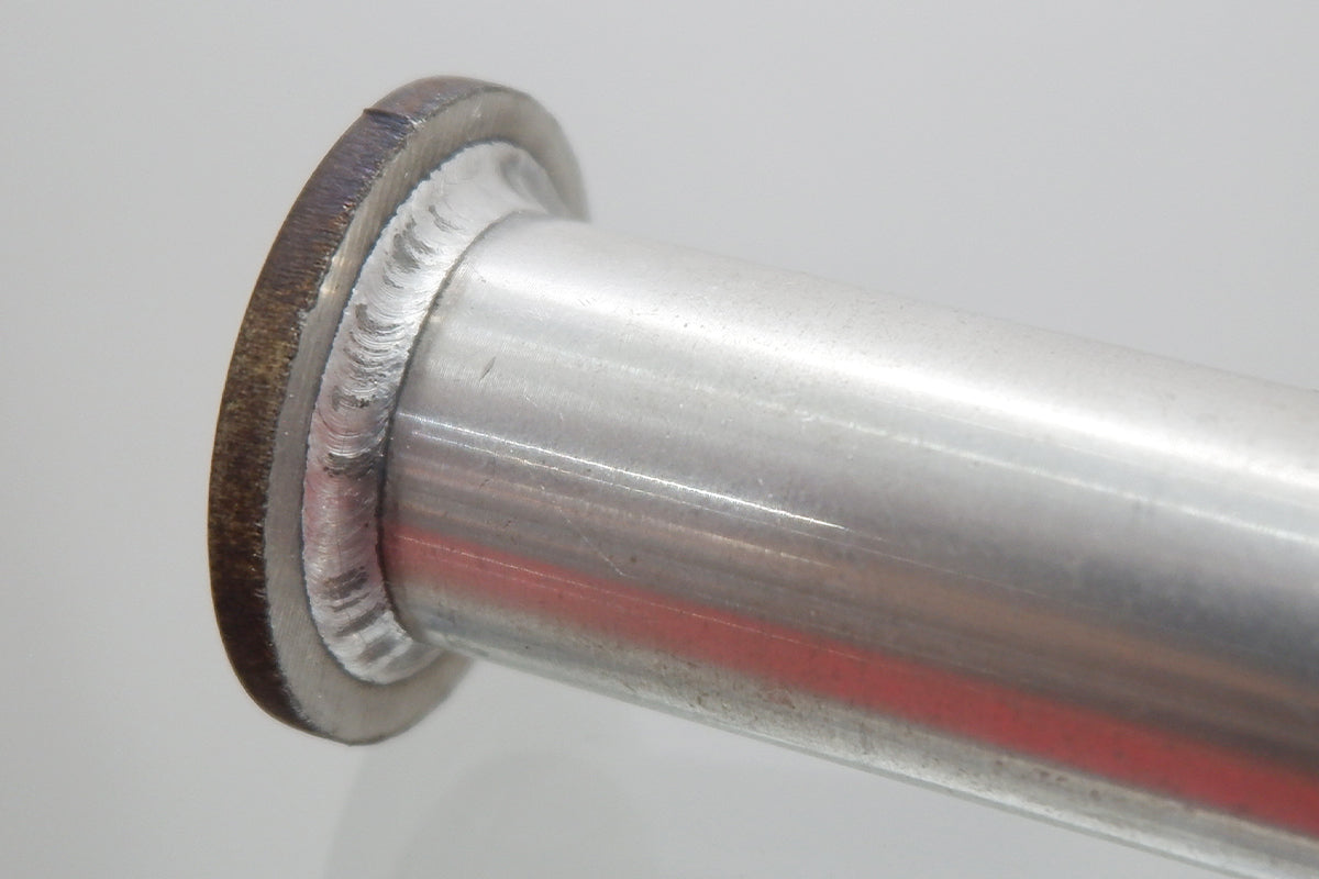 Close-up of a clean aluminum tube weld created by a laser welding machine with smooth and precise seams.