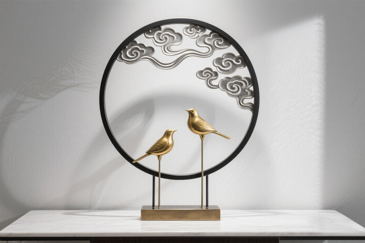 Metal circular art frame with decorative birds welded using precision laser spot welding.