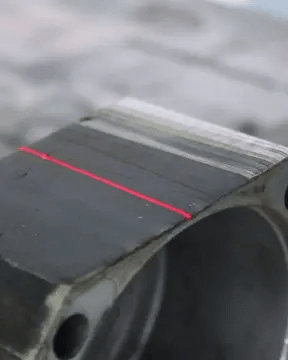 Laser rust cleaning process removing oxidation from a metal gear surface using SEAGULL4 pulse laser cleaner.