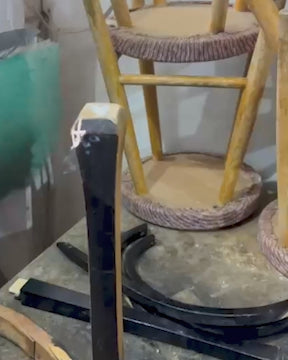 “Laser cleaning process removing paint from a wooden furniture surface with precision.”