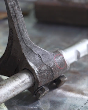 “Laser cleaning process removing oil and contaminants from the metal component surface.”